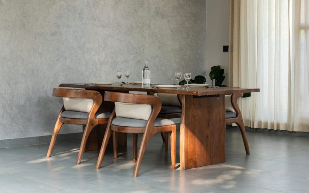 Dining table and chair set for a modern hospitality interior