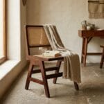 Chandigarh cane dining chair styled at a solid wood dining table