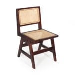Chandigarh cane dining chair studio angled view on a white background