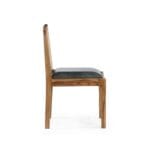 Moon cane dining chair studio side profile on a white background