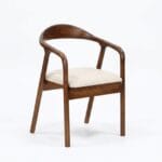 Neerja dining armchair studio angled view on a white background