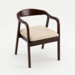 Rena wooden dining chair with curved arms and cream upholstered seat by Samyog Living