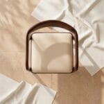 Rena dining chair rear view showing the upholstered back panel