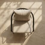 Ross metal arm chair front view in soft daylight