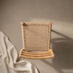 Sara dining chair rear view showing the woven rope seat