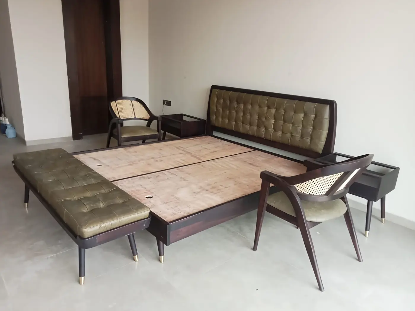 Hotel bedroom furniture layout during on-site installation at Maira Resort.