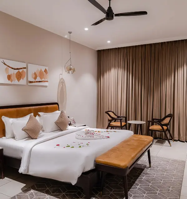 Completed Garden View Room with coordinated solid wood hotel furniture.